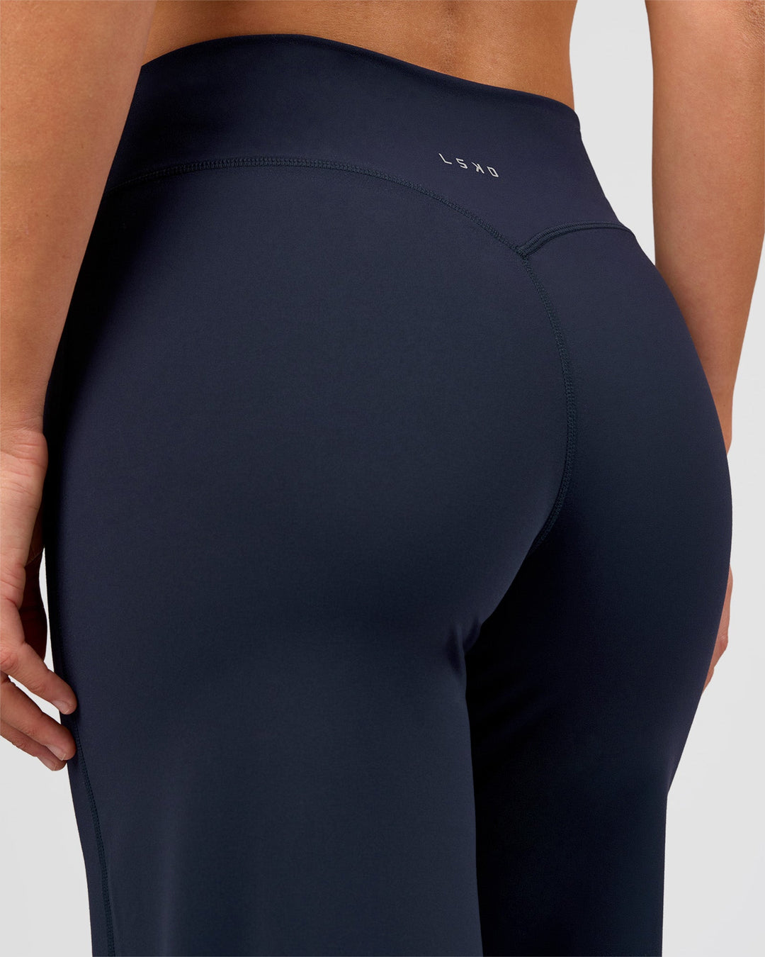 Woman wearing Elixir High-Rise Pant - Midnight Navy | Model:Amity | Size:S - view 5