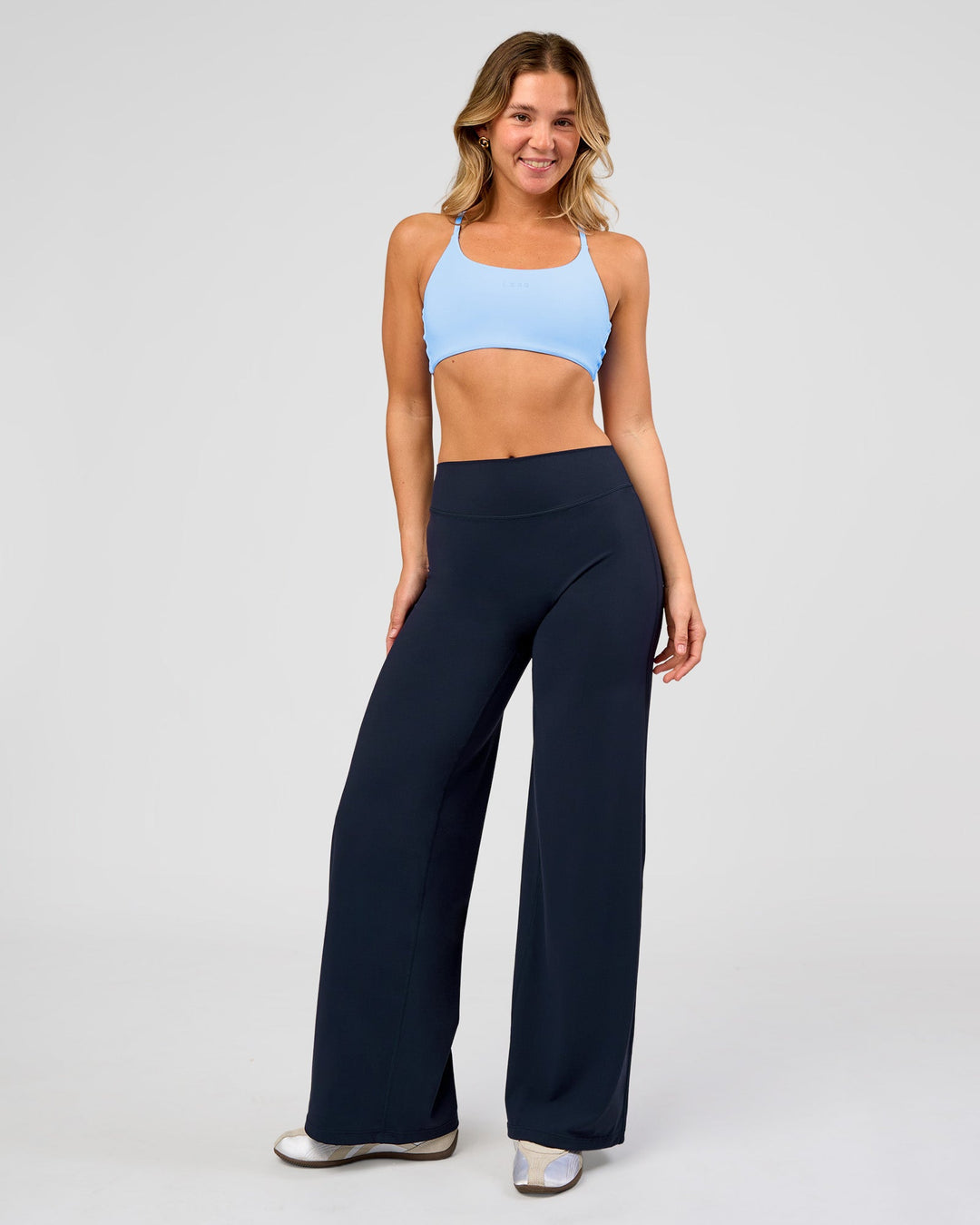 Woman wearing Elixir High-Rise Pant - Midnight Navy | Model:Amity | Size:S - view 6