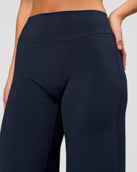 Woman wearing Elixir High-Rise Pant - Midnight Navy | Model:Amity | Size:S | Thumbnail Index: 7