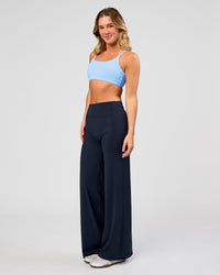 Woman wearing Elixir High-Rise Pant - Midnight Navy | Model:Amity | Size:S | Thumbnail Index: 8