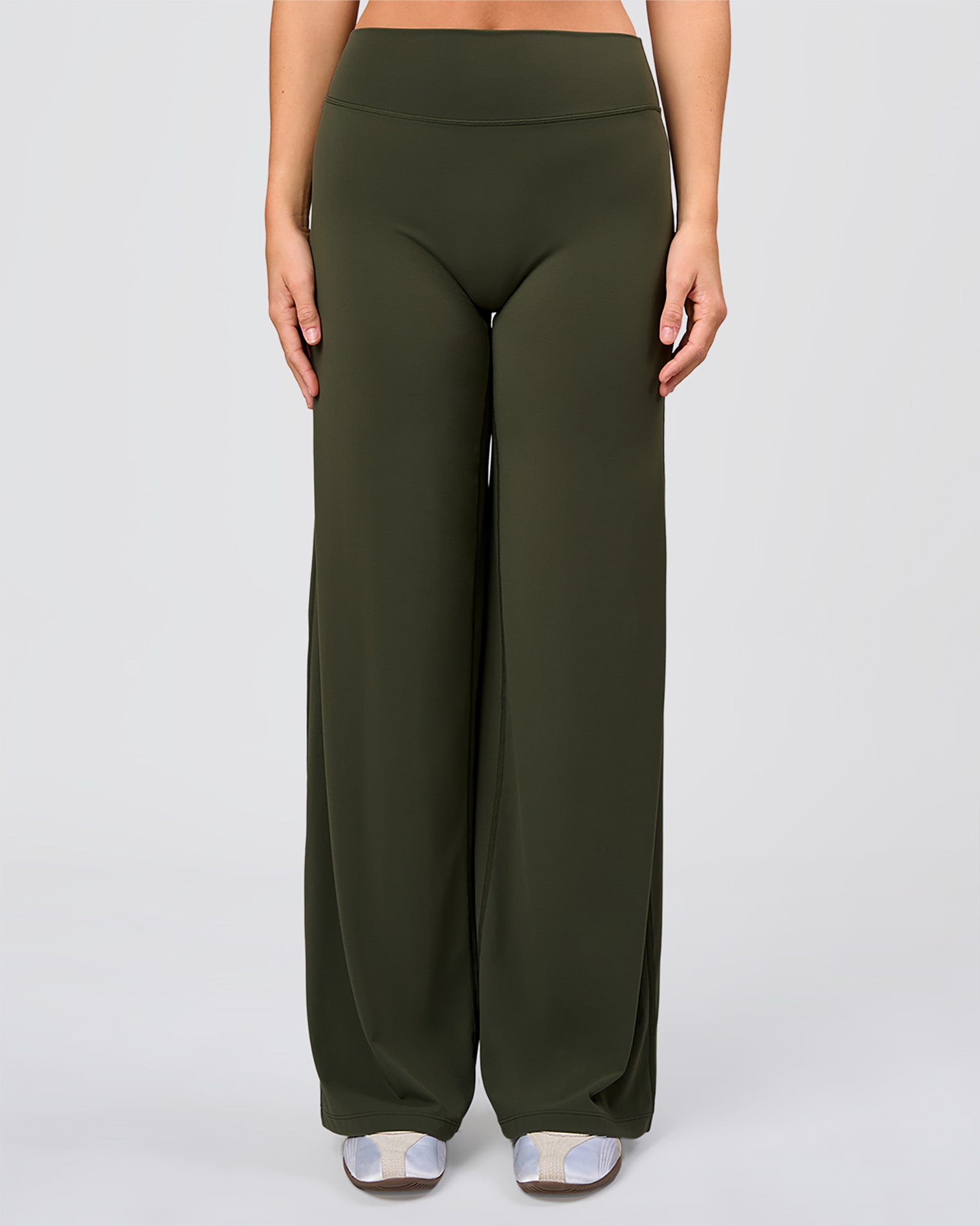 Woman wearing Elixir High-Rise Pant - Pure Olive | Model:Amity | Size:S