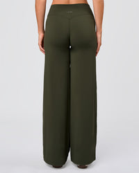 Woman wearing Elixir High-Rise Pant - Pure Olive | Model:Amity | Size:S | Thumbnail Index: 4
