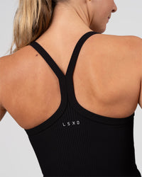 Woman wearing Flame Ribbed Regular Length Tank - Black | Model: Amity | Size: S | Thumbnail Index: 1