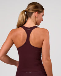 Woman wearing Flow Rep Scoop Neck Tank - Cherry Lacquer | Model:Amity | Size:S | Thumbnail Index: 1