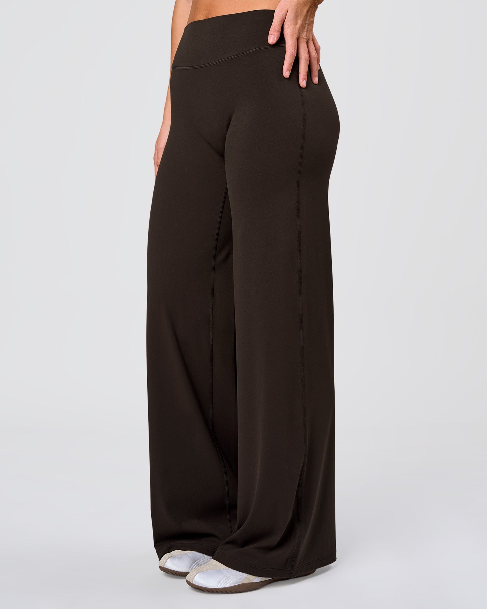 Woman wearing Elixir High-Rise Pant - Ground Coffee | Model:Amity | Size:S