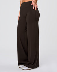 Woman wearing Elixir High-Rise Pant - Ground Coffee | Model:Amity | Size:S | Thumbnail Index: 0