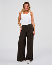 Woman wearing Elixir High-Rise Pant - Ground Coffee | Model:Amity | Size:S | Thumbnail Index: 6