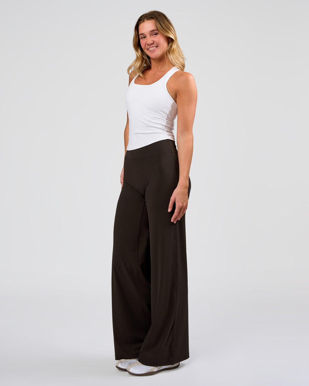 Woman wearing Elixir High-Rise Pant - Ground Coffee | Model:Amity | Size:S - view 9