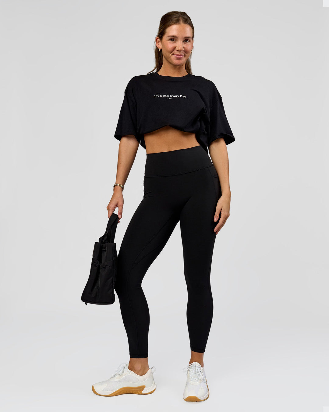 Woman wearing O.G. Fusion High-Rise Full Length Legging Pockets - Black | Model:Amity | Size:S - view 1