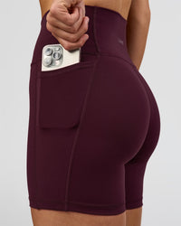 Woman wearing O.G. Fusion Ultra High-Rise 6" Short Pockets - Cherry Lacquer | Model:Amity | Size:S | Thumbnail Index: 4