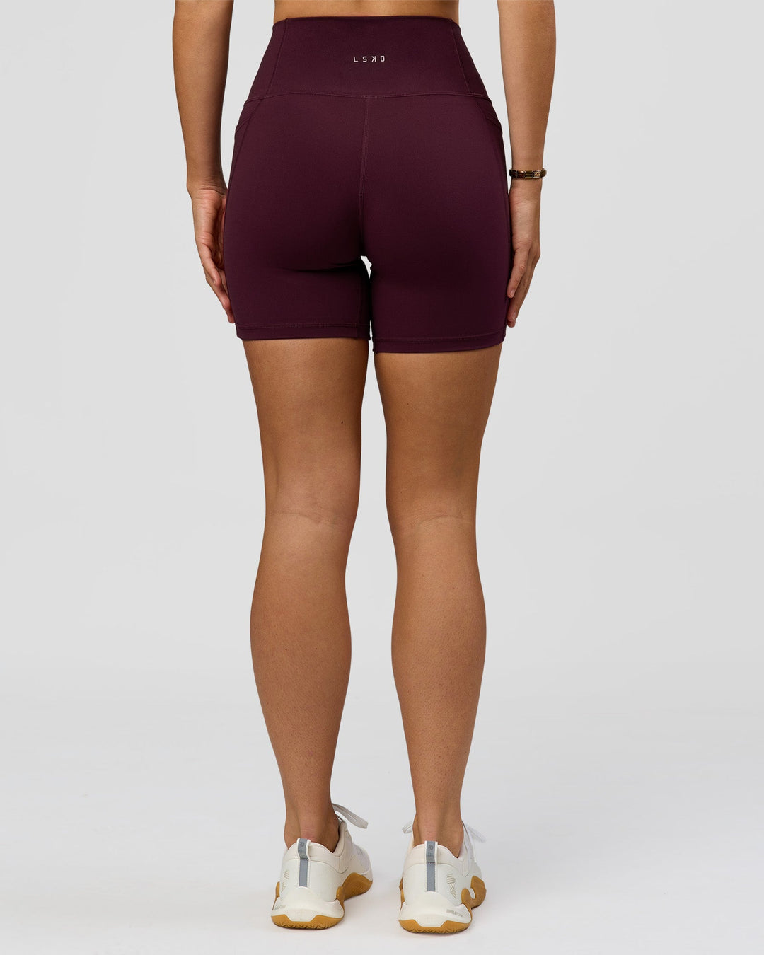 Woman wearing O.G. Fusion Ultra High-Rise 6" Short Pockets - Cherry Lacquer | Model:Amity | Size:S - view 9