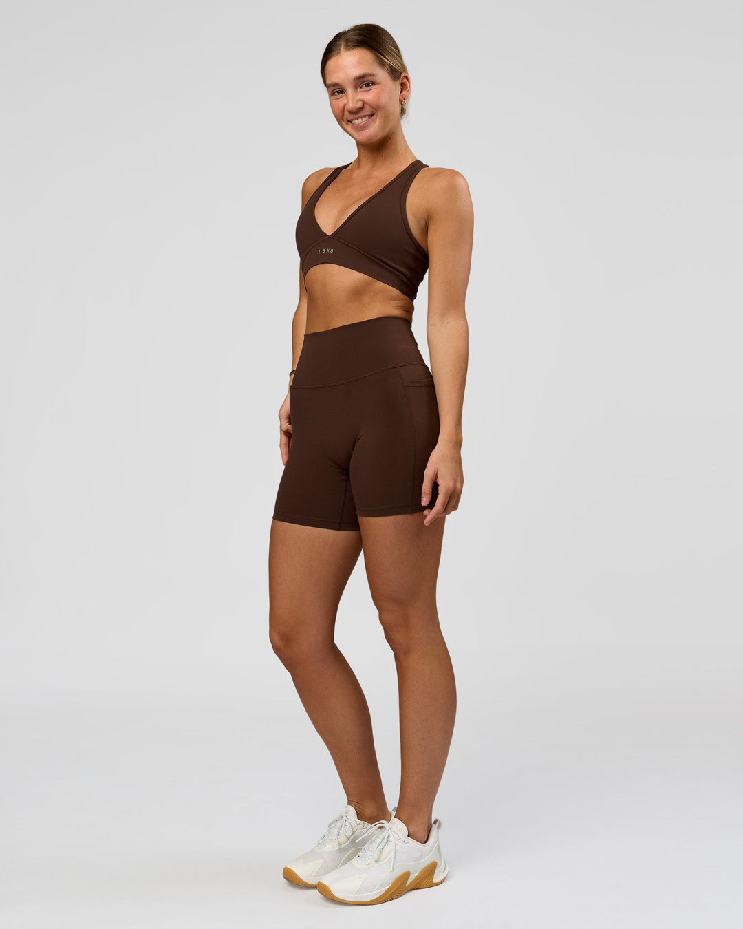 Woman wearing O.G. Fusion Ultra High-Rise 6" Short Pockets - Hot Chocolate | Model:Amity | Size:S - view 8