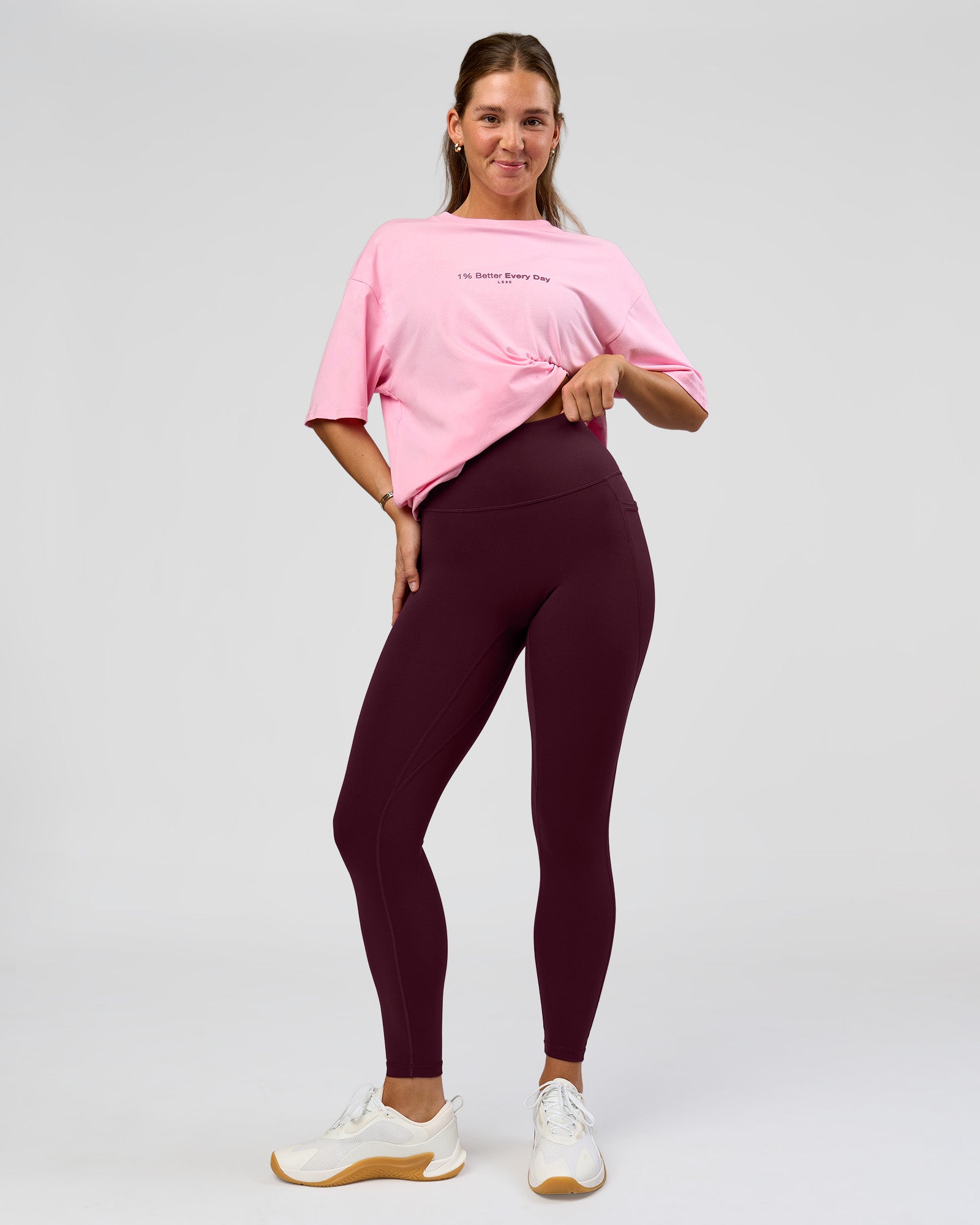 Woman wearing O.G. Fusion Ultra High-Rise Full Length Legging Pockets - Cherry Lacquer | Model:Amity | Size:S