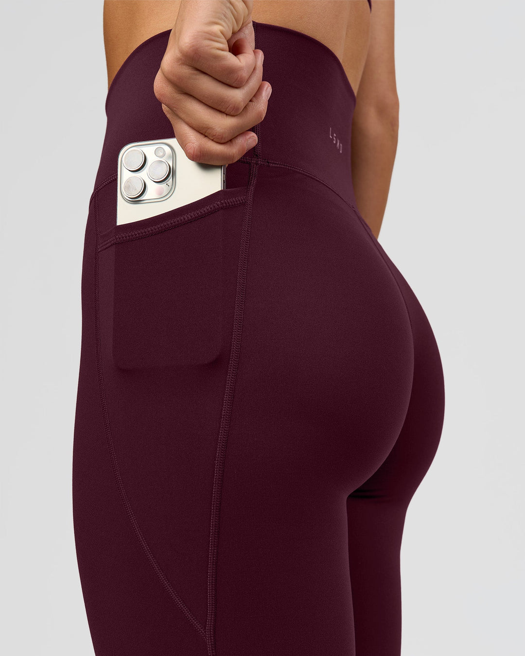 Woman wearing O.G. Fusion Ultra High-Rise Full Length Legging Pockets - Cherry Lacquer | Model:Amity | Size:S - view 7