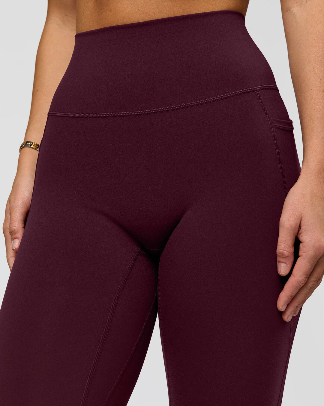 Woman wearing O.G. Fusion Ultra High-Rise Full Length Legging Pockets - Cherry Lacquer | Model:Amity | Size:S - view 3