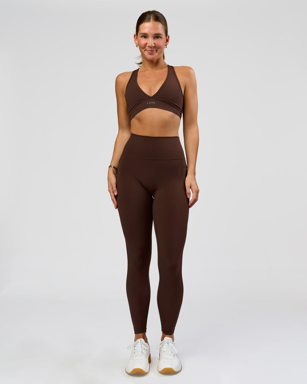 Woman wearing O.G. Fusion Ultra High-Rise Full Length Legging Pockets - Hot Chocolate | Model:Amity | Size:S - view 2