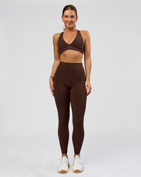 Woman wearing O.G. Fusion Ultra High-Rise Full Length Legging Pockets - Hot Chocolate | Model:Amity | Size:S | Thumbnail Index: 1