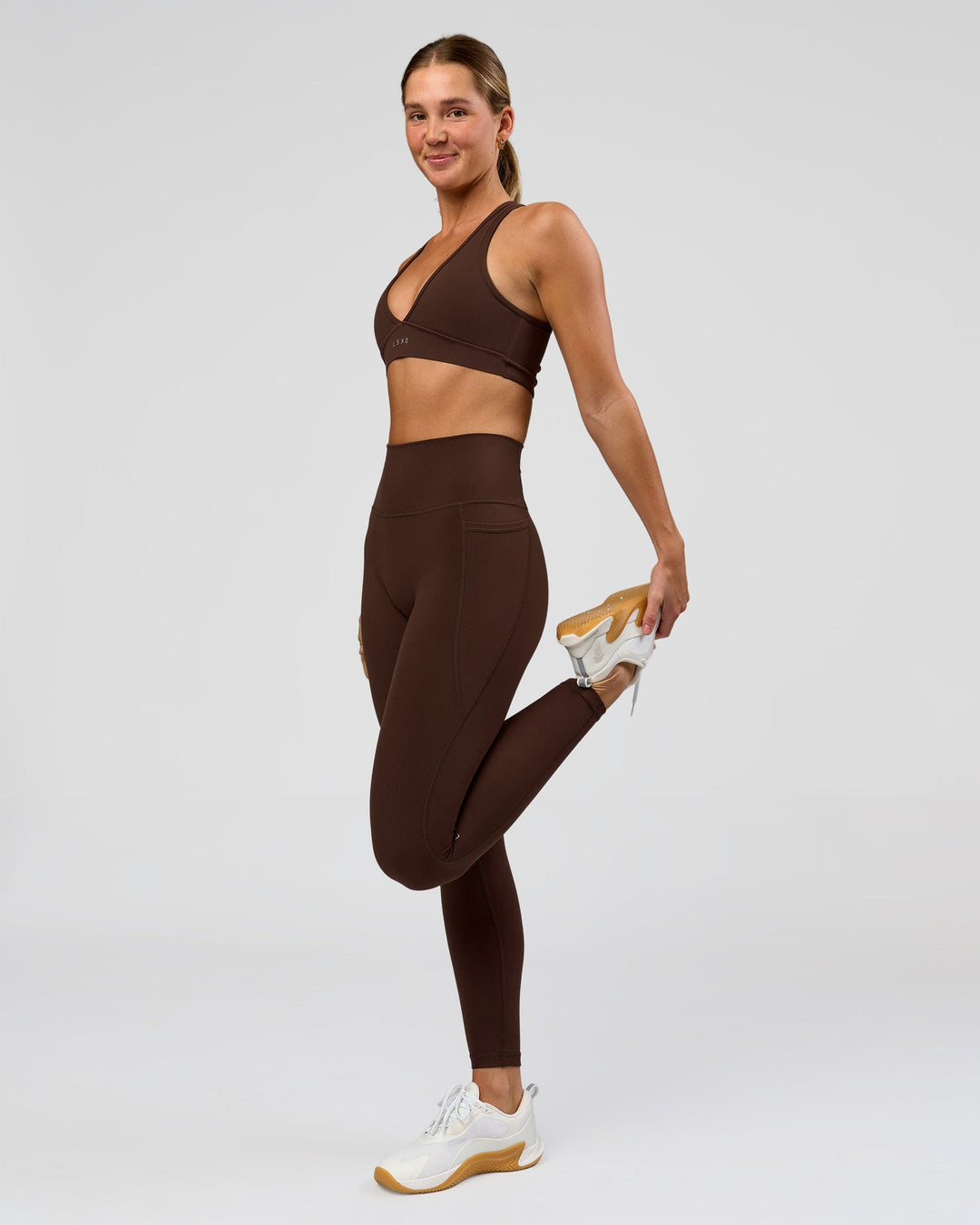 Woman wearing O.G. Fusion Ultra High-Rise Full Length Legging Pockets - Hot Chocolate | Model:Amity | Size:S - view 4