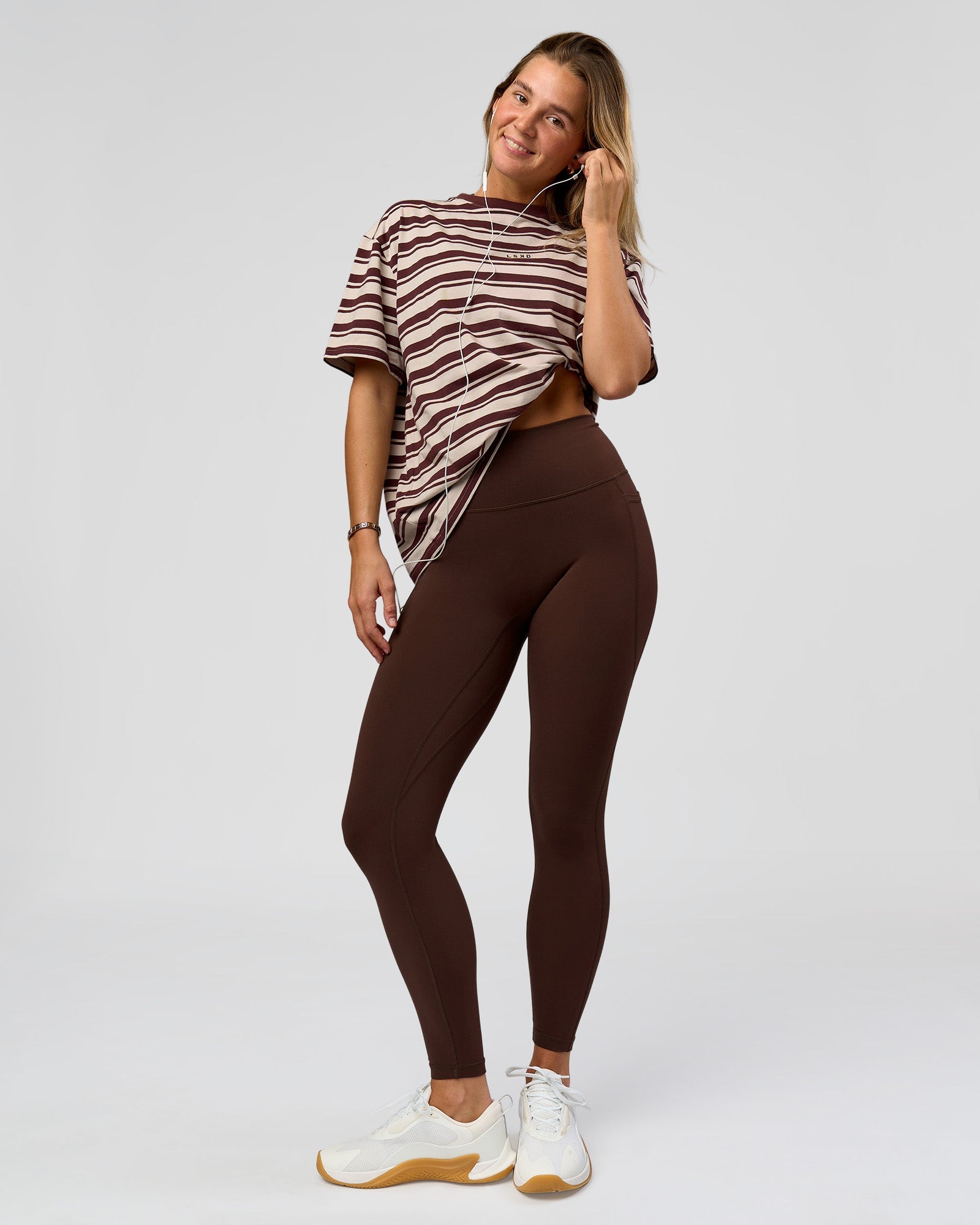 Woman wearing O.G. Fusion Ultra High-Rise Full Length Legging Pockets - Hot Chocolate | Model:Amity | Size:S