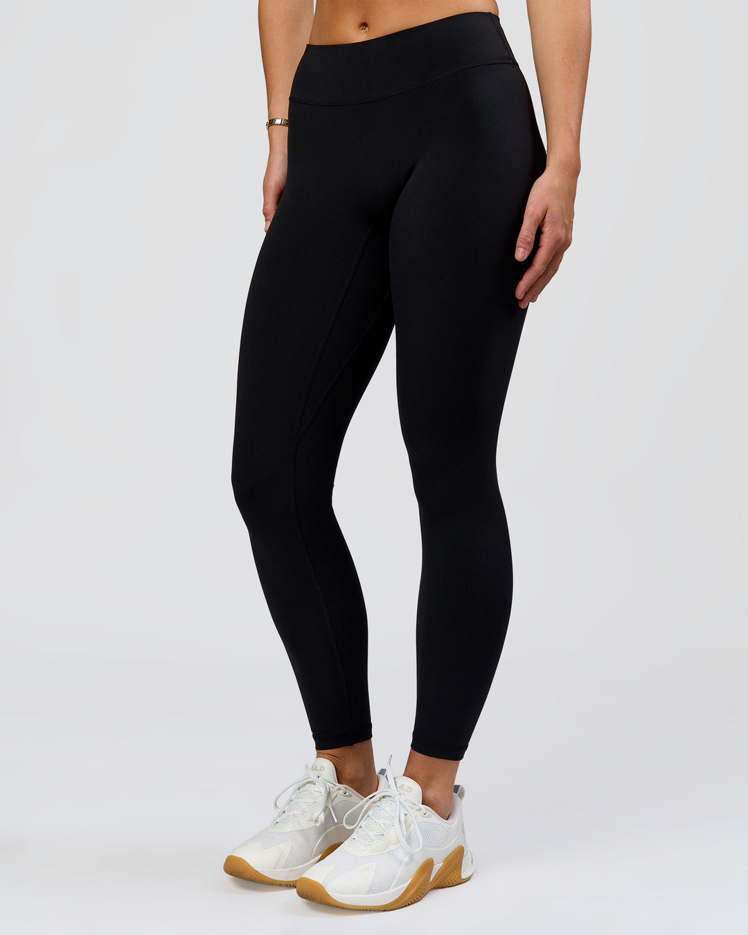 Woman wearing RXD Mid-Rise Full Length Legging - Black | Model:Amity | Size:S - view 2