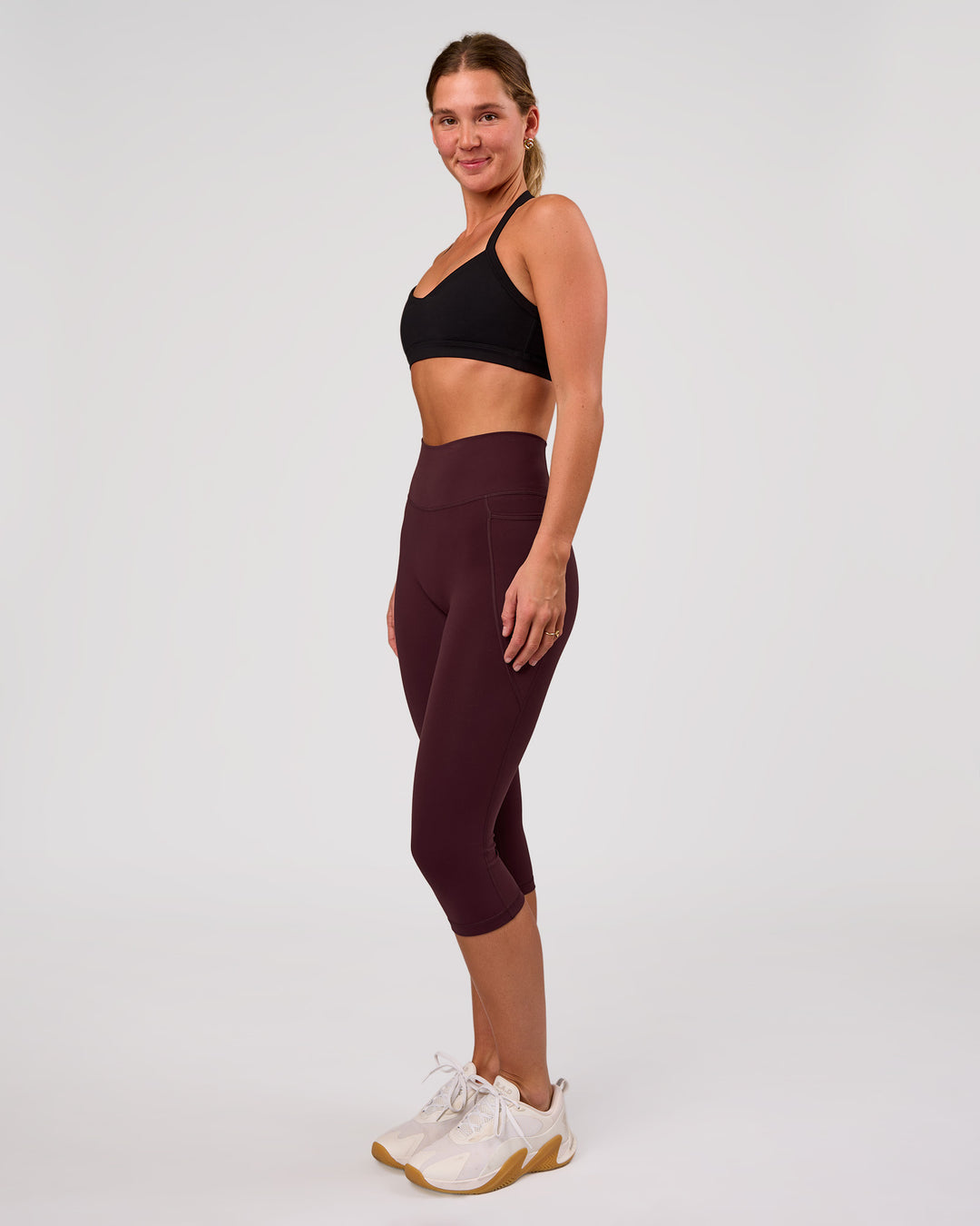Woman wearing Unleash Sports Bra - Black | Model:Amity | Size:S - view 4