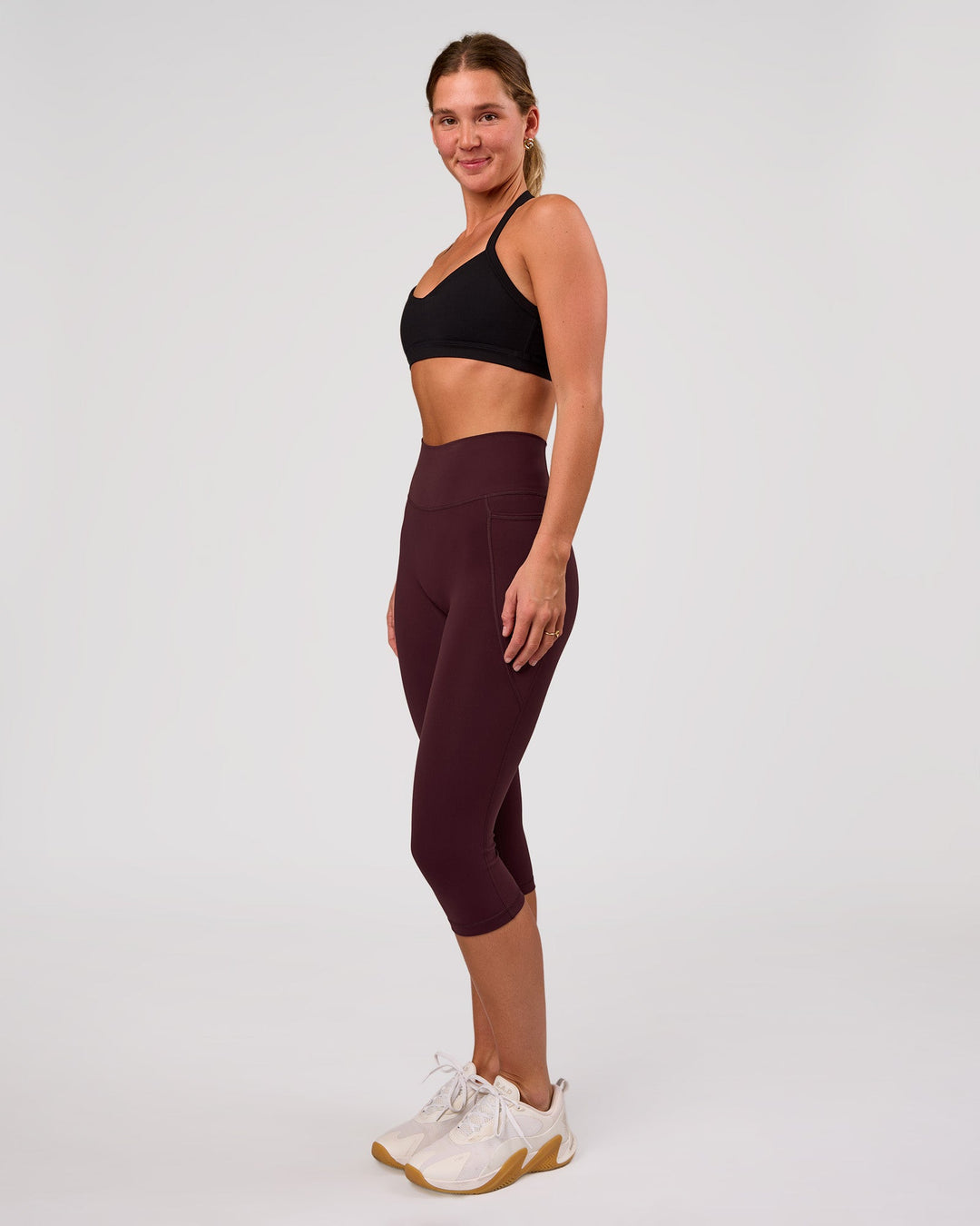 Woman wearing Unleash Sports Bra - Black | Model:Amity | Size:S - view 4