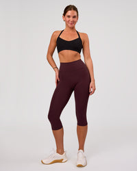 Woman wearing Unleash Sports Bra - Black | Model:Amity | Size:S | Thumbnail Index: 4