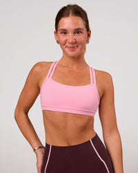 Woman wearing Velocity Sports Bra - Pink Rose | Model:Amity | Size:S | Thumbnail Index: 2