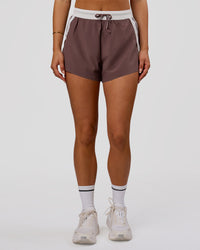 Woman wearing Accelerate 3" Force High-Rise Running Short - Cocoa Powder | Model:Bianca | Size:S | Thumbnail Index: 2