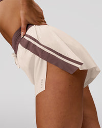 Woman wearing Accelerate 3" Force High-Rise Running Short - Cocoa Powder-Off White | Model:Bianca | Size:S | Thumbnail Index: 6