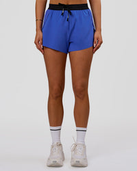 Woman wearing Accelerate 3" High-Rise Running Short - Black-Power Cobalt | Model:Bianca | Size:S | Thumbnail Index: 5