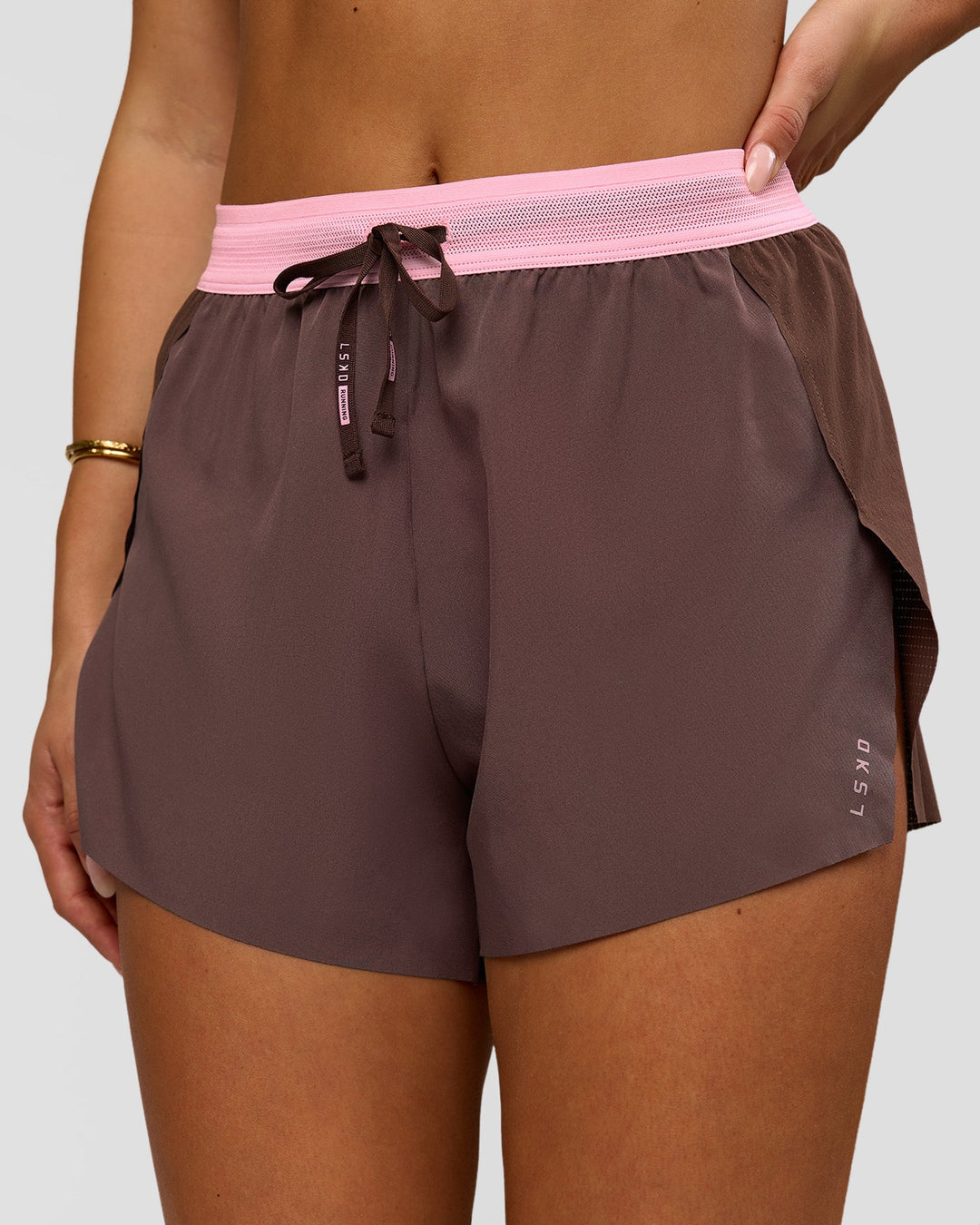 Woman wearing Accelerate 3" High-Rise Running Short - Neapolitan | Model:Bianca | Size:S - view 2