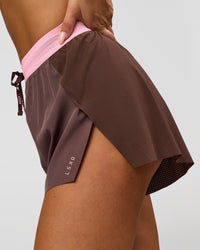 Woman wearing Accelerate 3" High-Rise Running Short - Neapolitan | Model:Bianca | Size:S | Thumbnail Index: 3