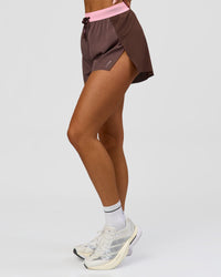 Woman wearing Accelerate 3" High-Rise Running Short - Neapolitan | Model:Bianca | Size:S | Thumbnail Index: 11