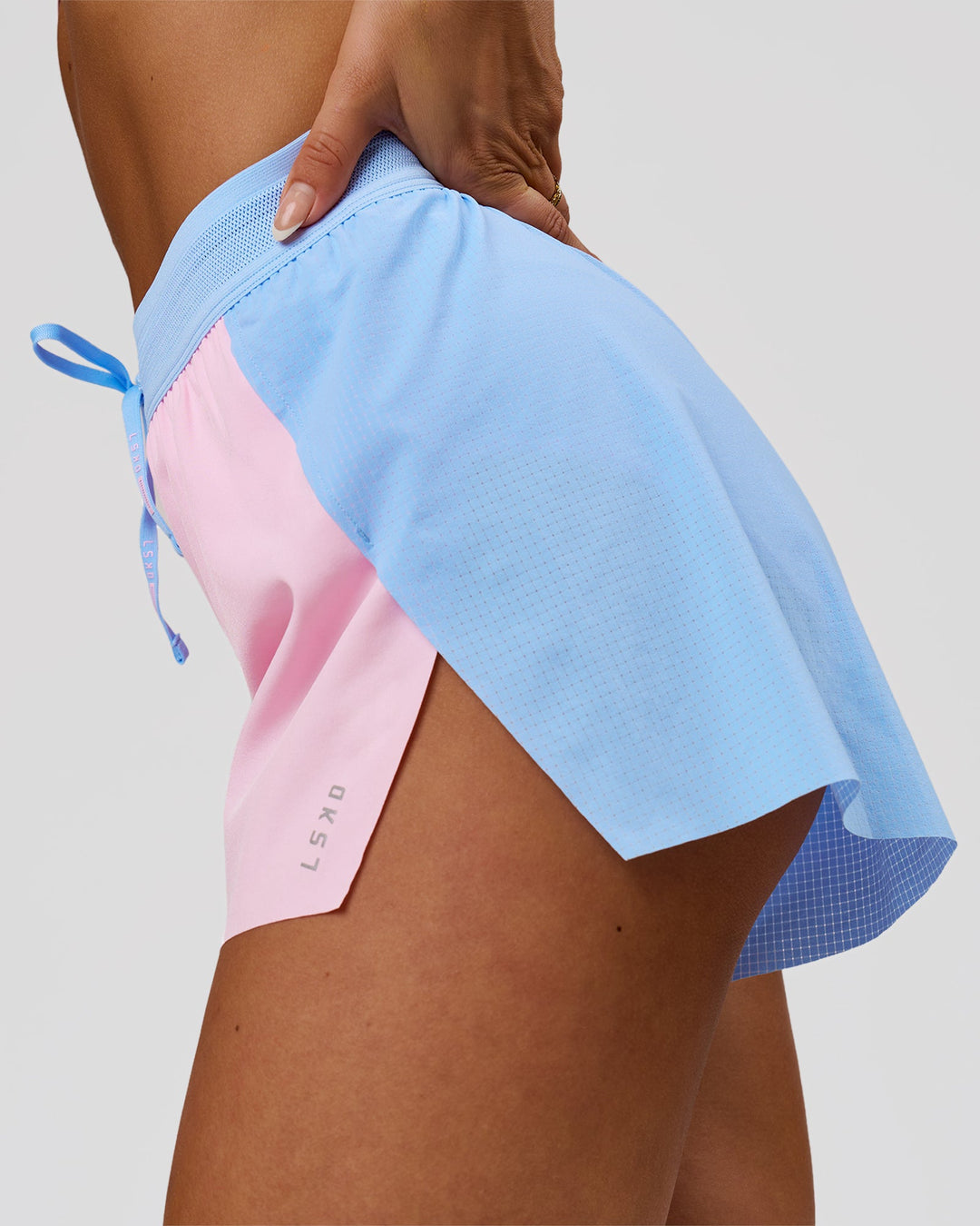 Woman wearing Accelerate 3" High-Rise Running Short - Open Air-Marshmallow | Model:Bianca | Size:S - view 8