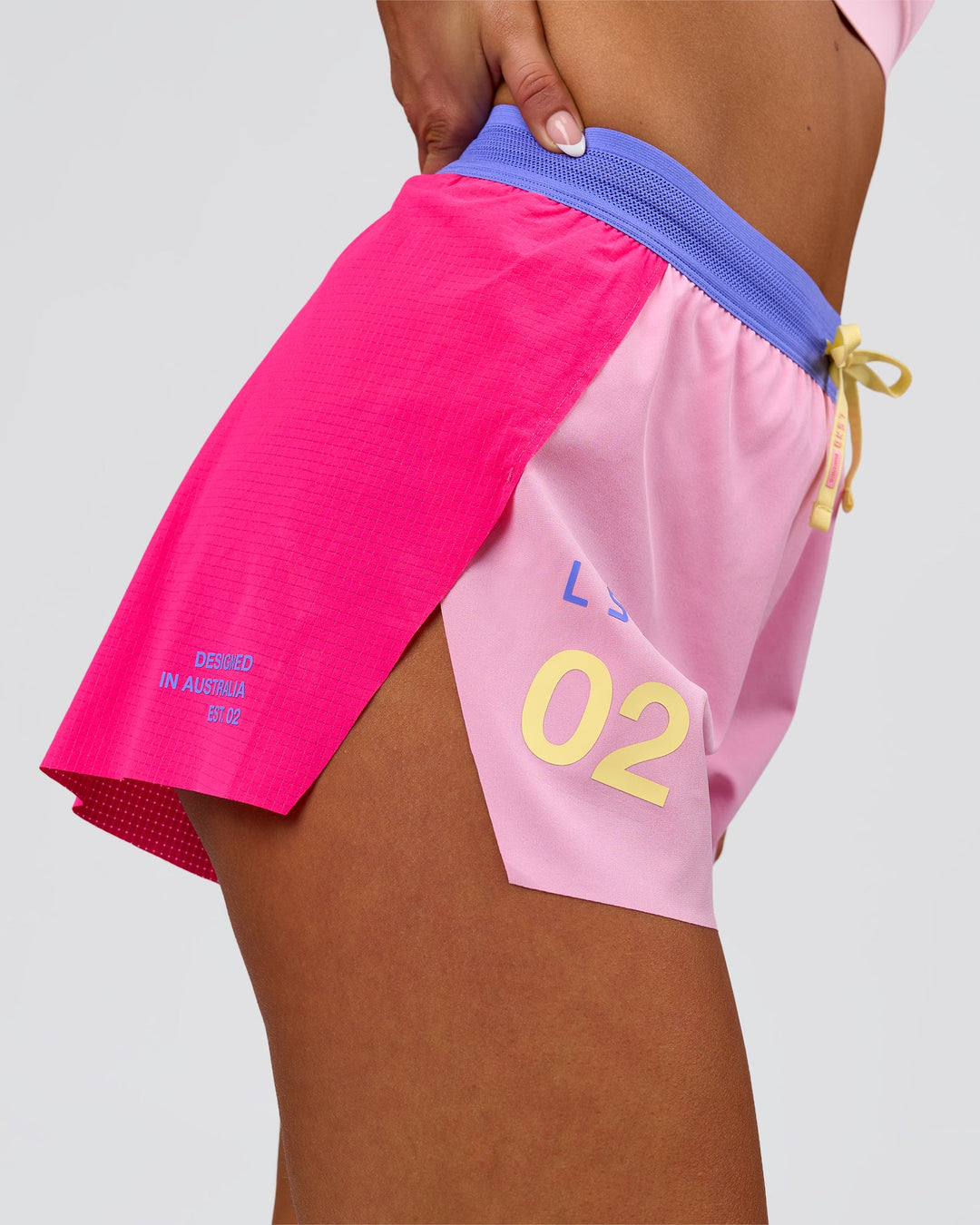 Woman wearing Accelerate 3" High-Rise Running Short - Ultra Pink-Tech Department | Model:Bianca | Size:S - view 2