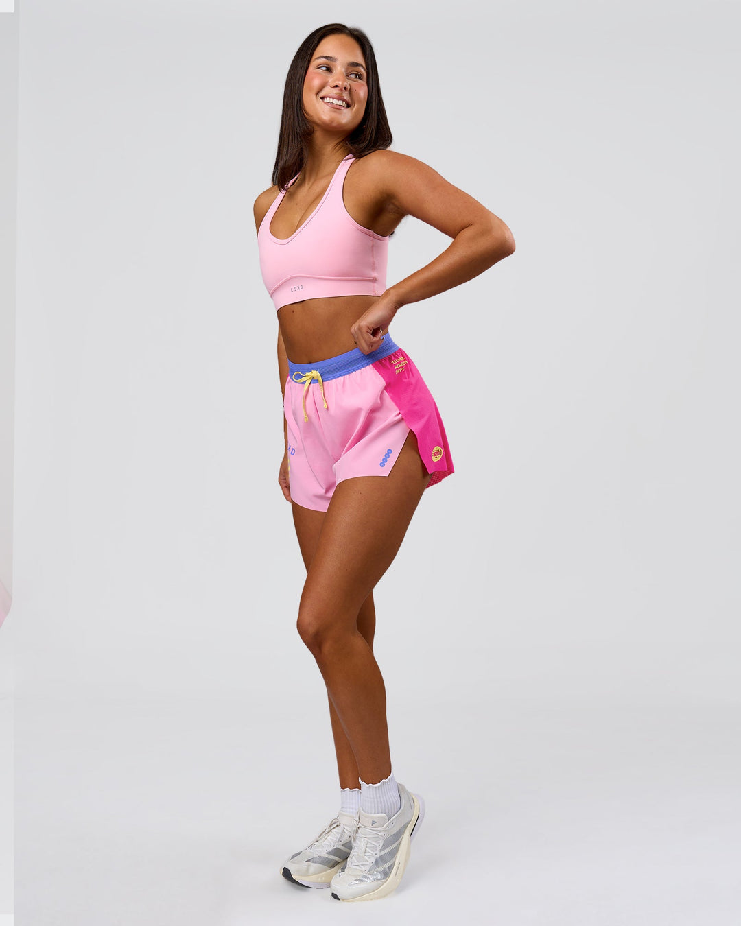 Woman wearing Accelerate 3" High-Rise Running Short - Ultra Pink-Tech Department | Model:Bianca | Size:S - view 5