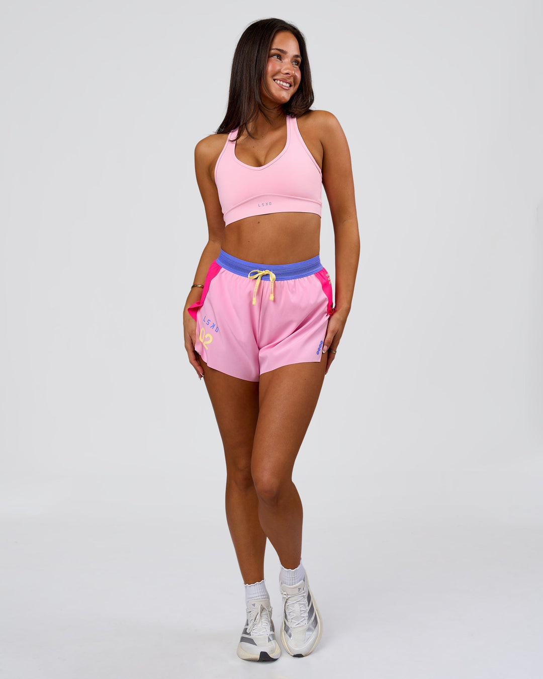 Woman wearing Accelerate 3" High-Rise Running Short - Ultra Pink-Tech Department | Model:Bianca | Size:S - view 10