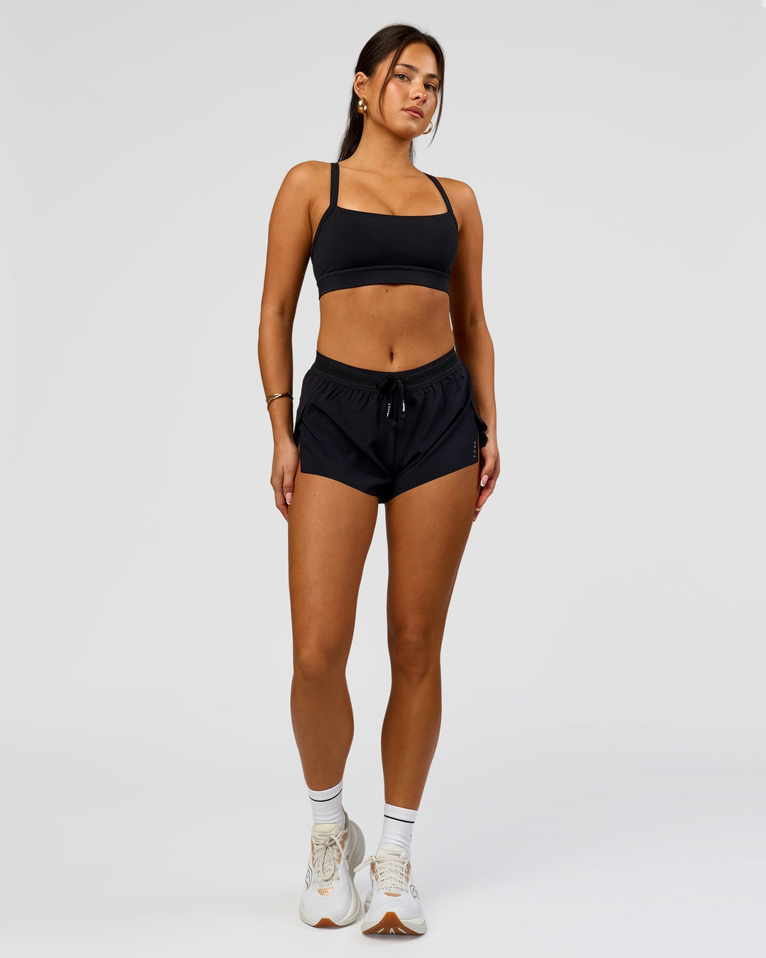 Woman wearing Accelerate 3" Mid-Rise Running Short - Black | Model:Bianca | Size:S - view 6