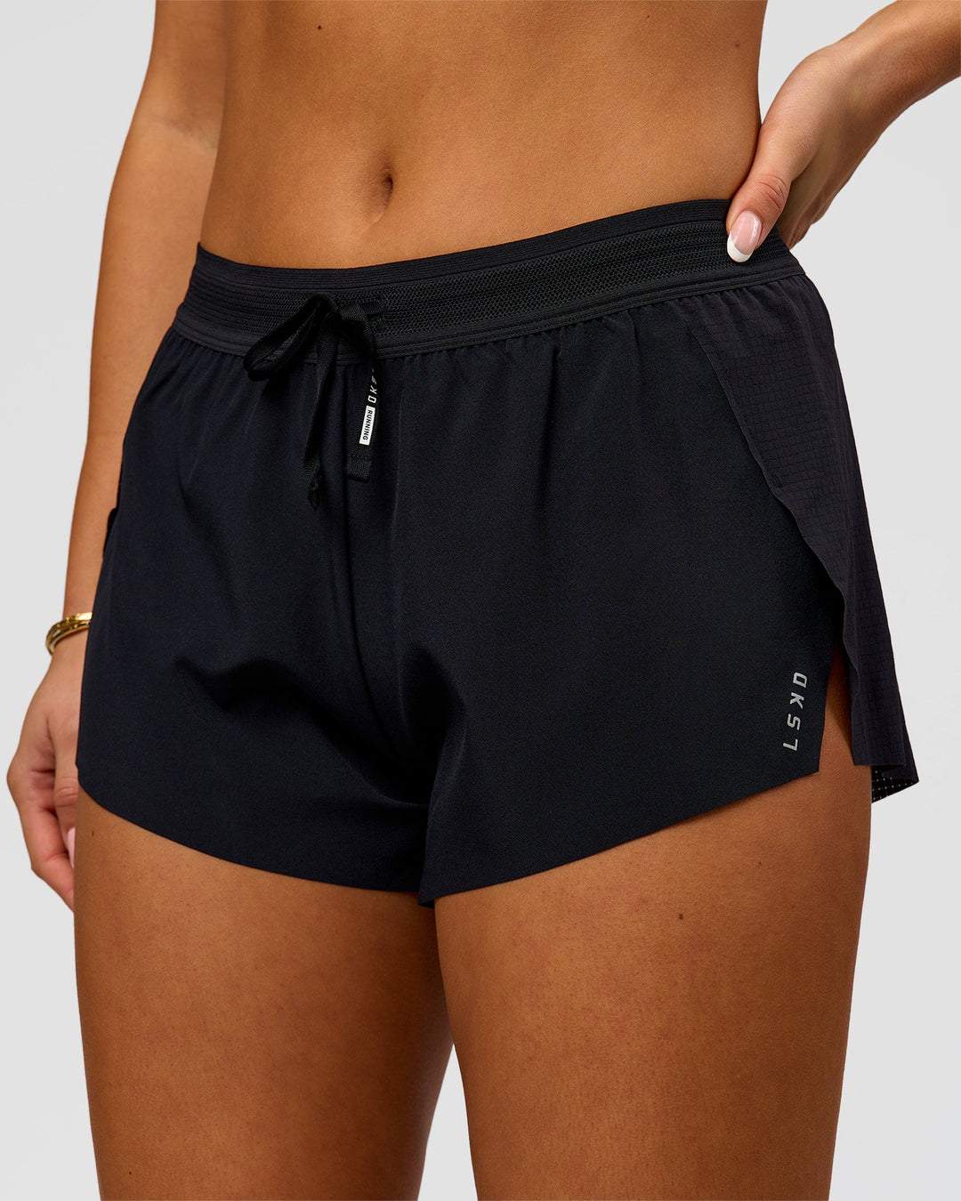 Woman wearing Accelerate 3" Mid-Rise Running Short - Black | Model:Bianca | Size:S - view 1