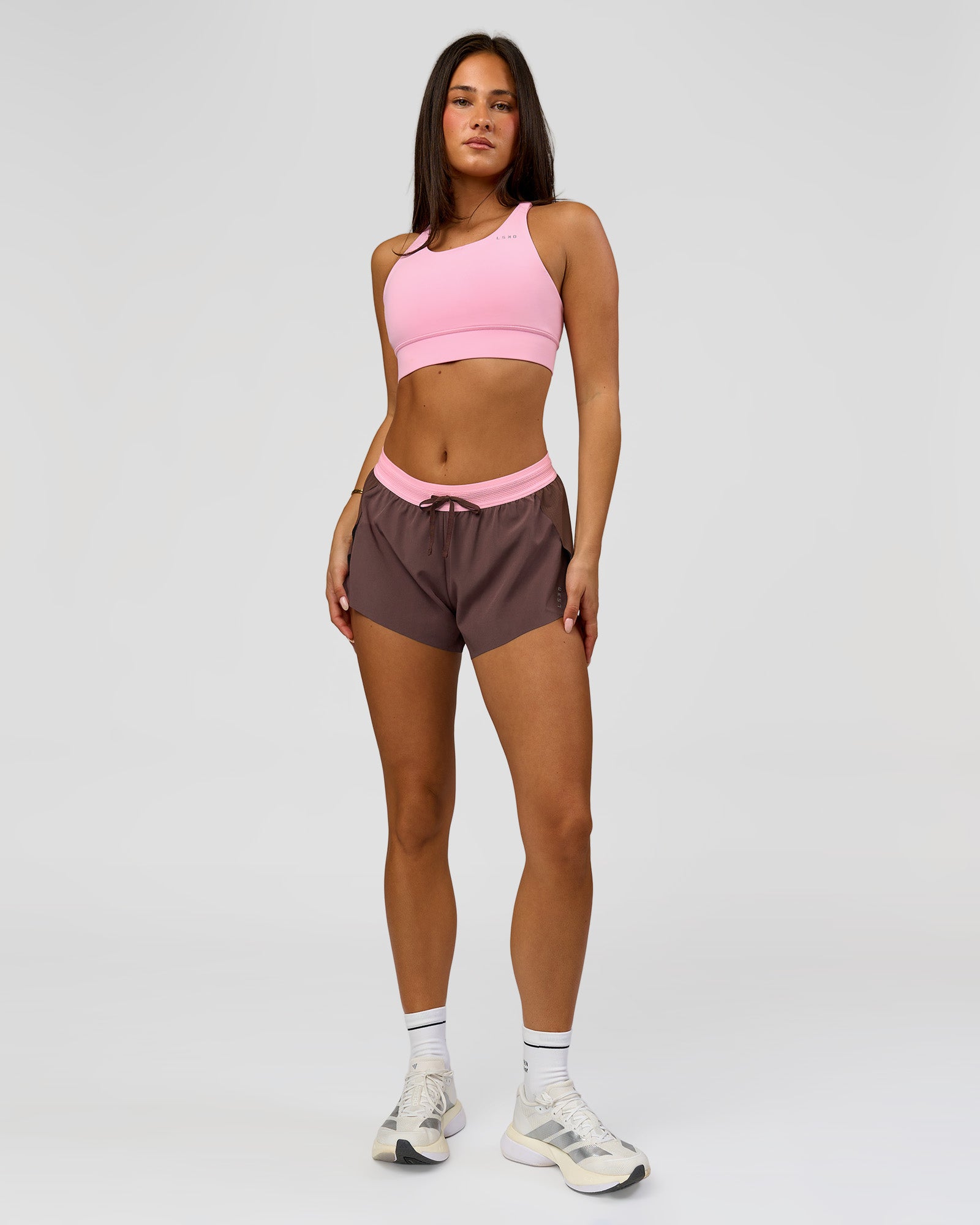 Woman wearing Accelerate 3" Mid-Rise Running Short - Neapolitan | Model:Bianca | Size:S