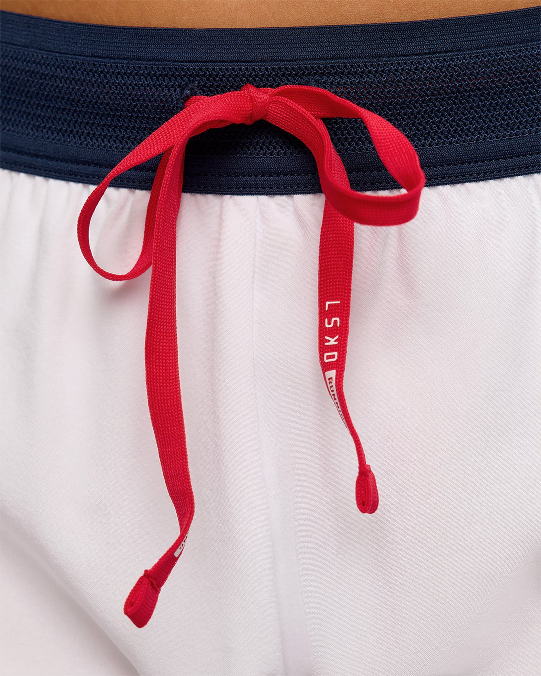 Woman wearing Accelerate 3" Mid-Rise Running Short - White-Future Navy | Model:Bianca | Size:S - view 14