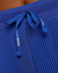 Woman wearing Accelerate 3" Pleated High-Rise Running Short - Power Cobalt | Model:Bianca | Size:S | Thumbnail Index: 8