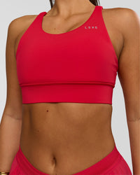 Woman wearing Accelerate Sports Bra - Scarlet | Model:Bianca | Size:S