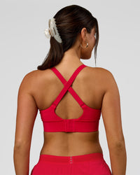 Woman wearing Accelerate Sports Bra - Scarlet | Model:Bianca | Size:S