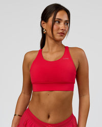 Woman wearing Accelerate Sports Bra - Scarlet | Model:Bianca | Size:S
