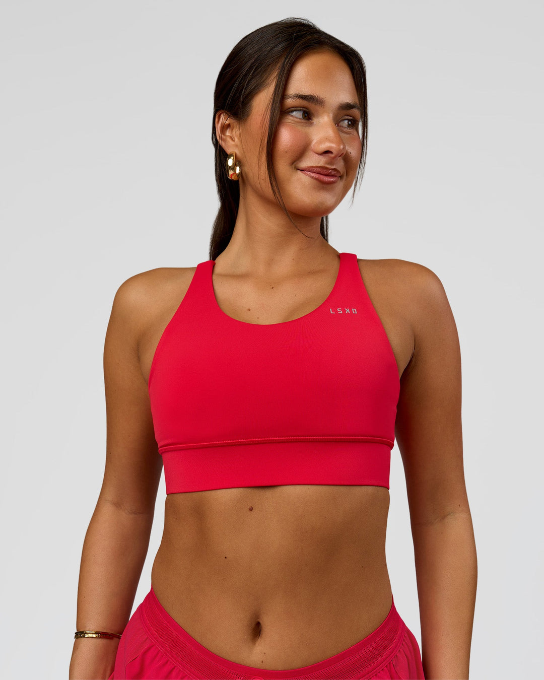 Woman wearing Accelerate Sports Bra - Scarlet | Model:Bianca | Size:S