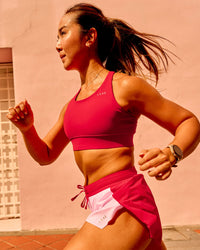 Woman wearing Accelerate Sports Bra - Scarlet | Model:Bianca | Size:S