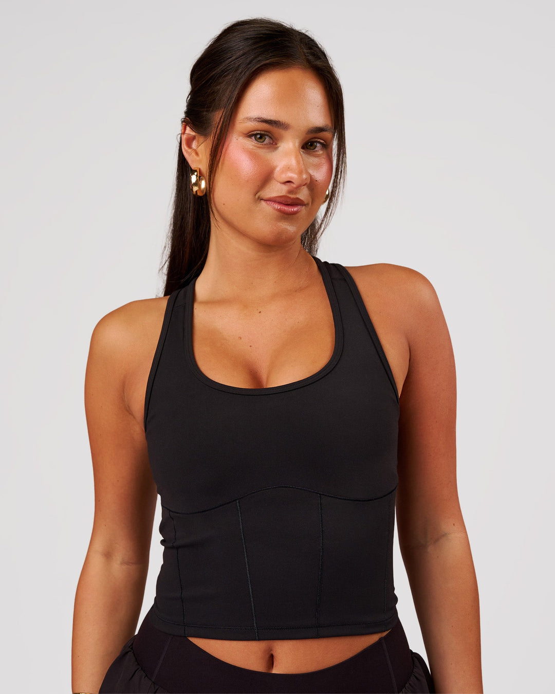 Woman wearing Aura Mesh Shelf Bra Tank - Black | Model:Bianca | Size:S - view 1
