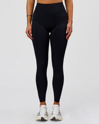 Woman wearing Elite Run High-Rise Full Length Legging Pockets - Black | Model:Bianca | Size:S | Thumbnail Index: 4